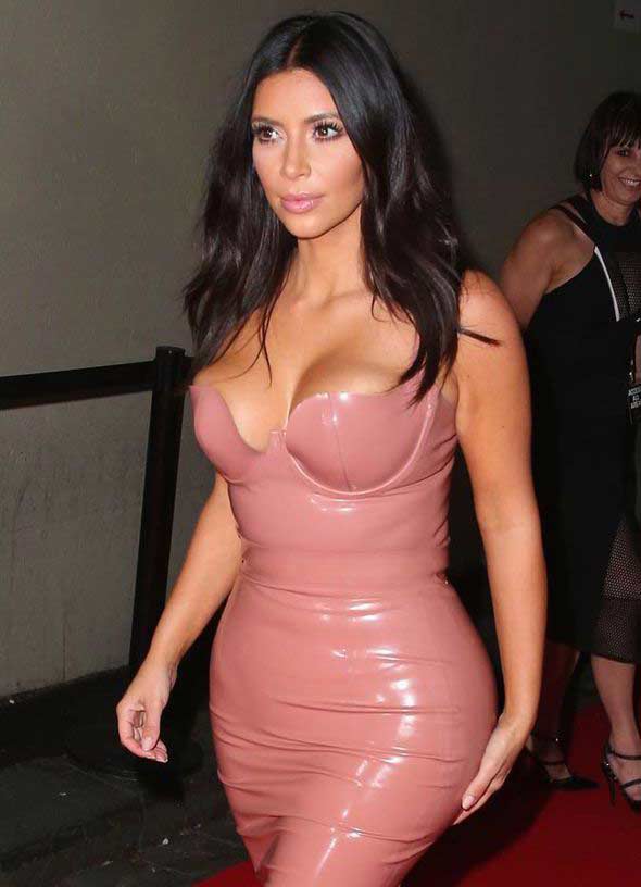 Kim in a pink plastic dress